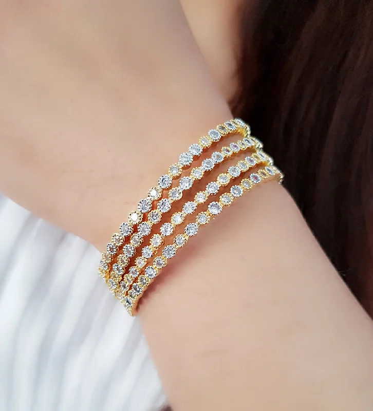 Ladies multi-layered bracelet-Gold-Plated Alloy Gold Silver American Diamond 4 Bangles - The Pari